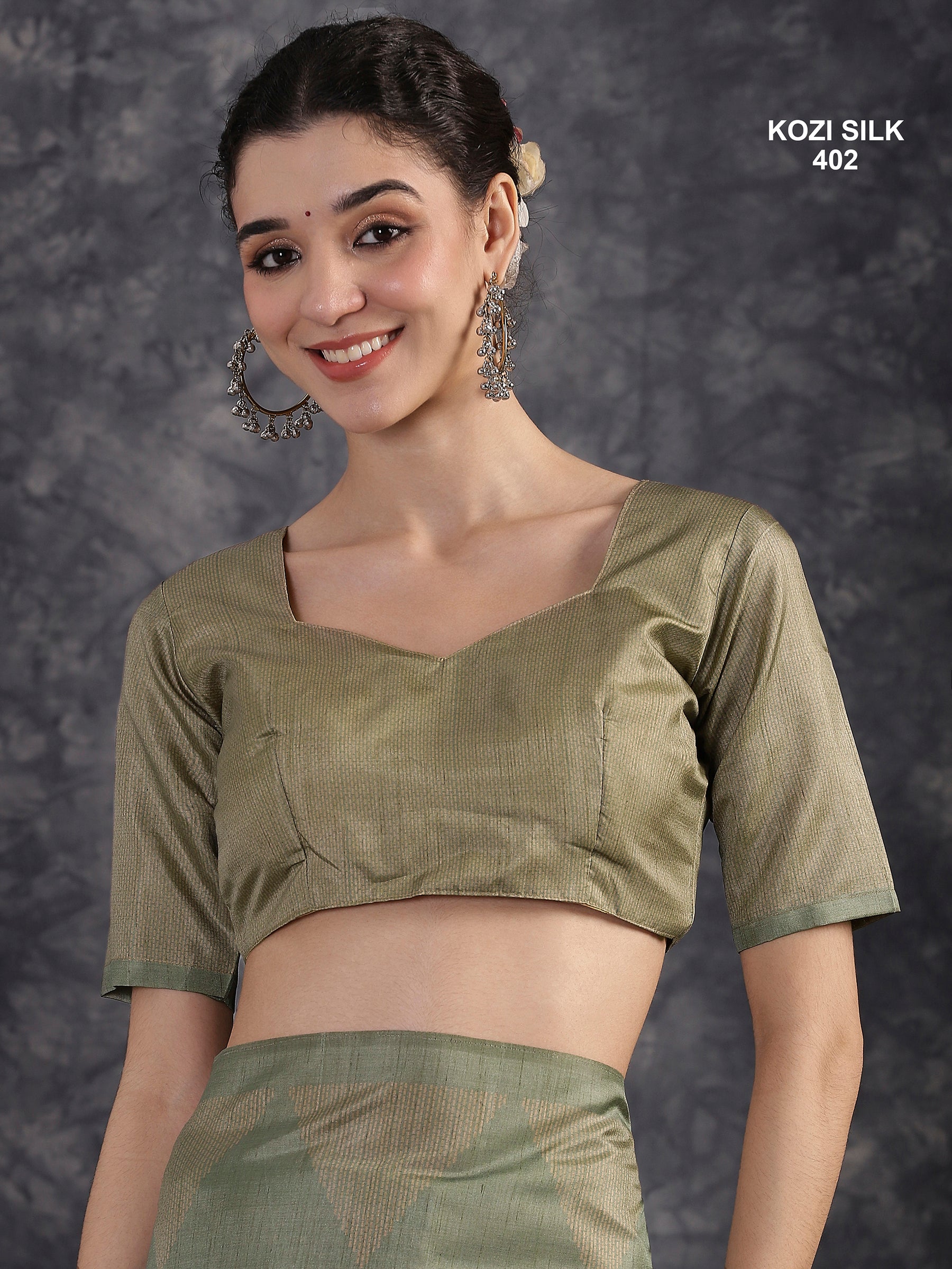 KOZI SILK-Elegant Beige & Sage Green Kozi Silk Saree with Geometric Zari Border and Rich Designer Pallu