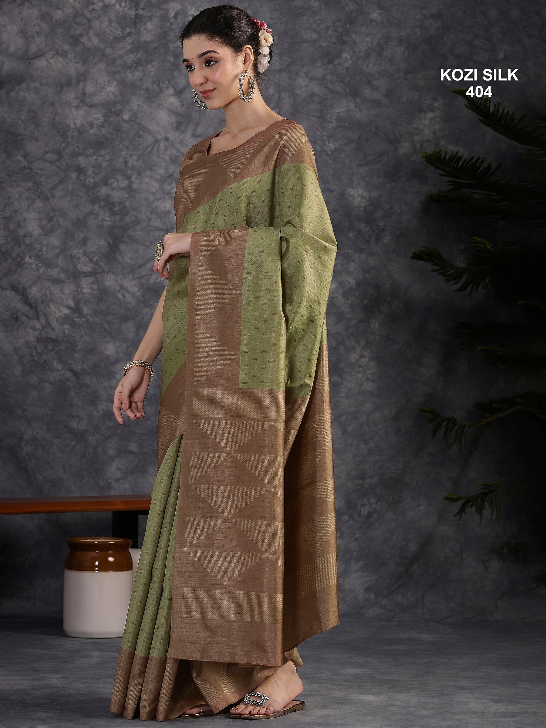 KOZI SILK-Elegant Sage Green Kozi Silk Saree with Copper Zari Geometric Border & Rich Woven Pallu