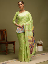 VANAYA-Elegant Pistachio Green Silver Zari Saree with Royal Heritage Print Pallu