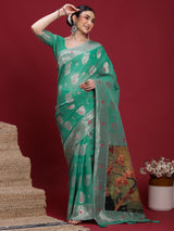 VANAYA-Elegant Emerald Green Silver Zari Saree with Floral Heritage Pallu Tassels