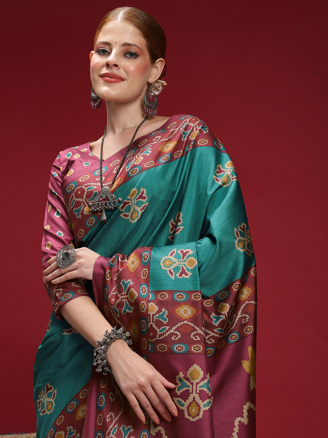 GULABI NAGRI-Elegant teal blue saree with rich maroon woven border