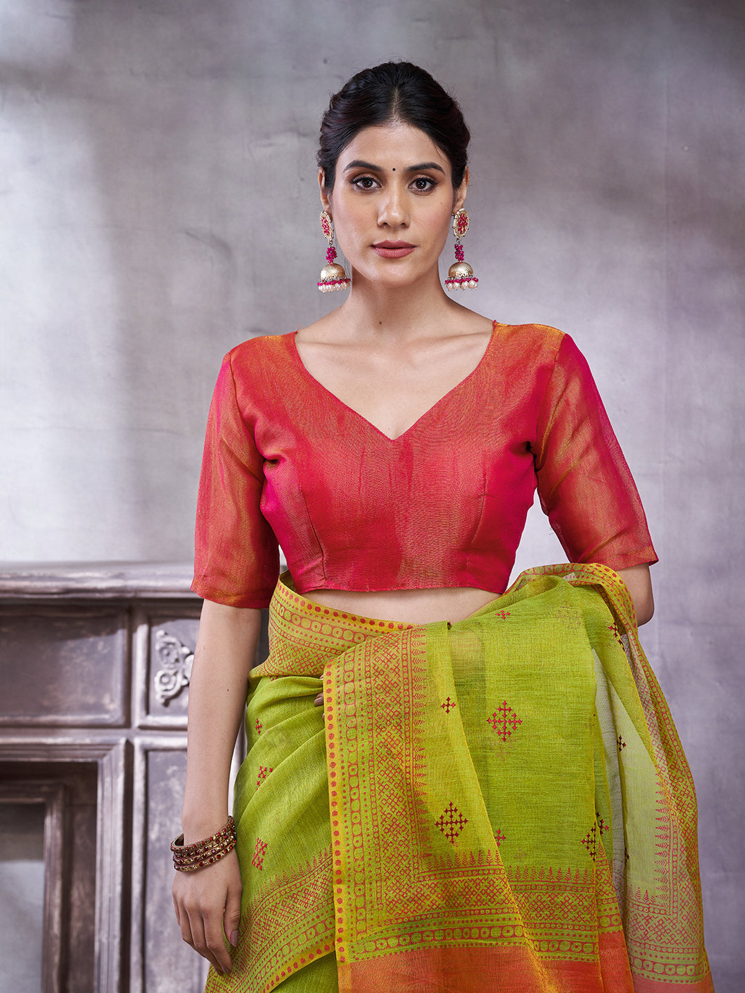 ZARI MAHAL-Elegant Olive Green Linen Saree with Orange Contrast Pallu & Traditional Zari Border Tassels