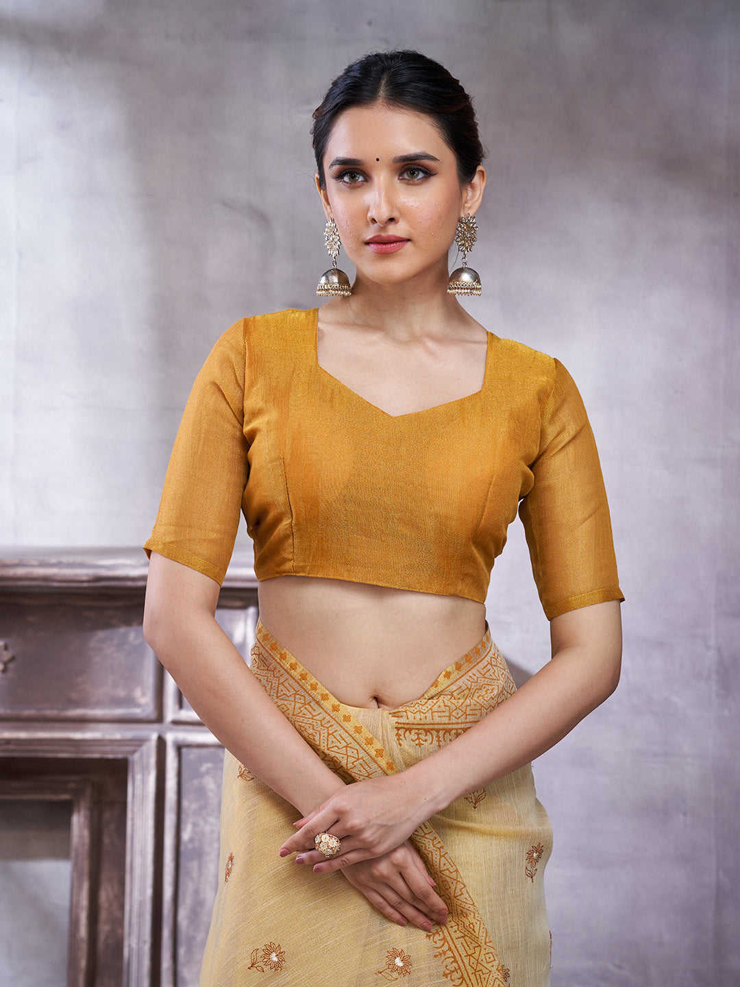 ZARI MAHAL-Elegant Cream Linen Saree with Mustard Yellow Contrast Pallu & Traditional Woven Zari Border Tassels