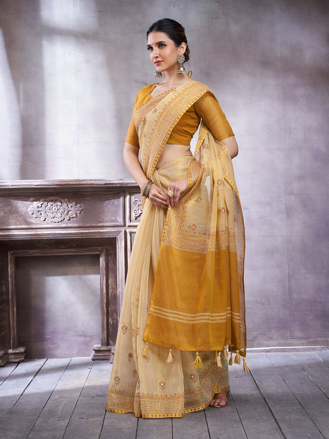 ZARI MAHAL-Elegant Cream Linen Saree with Mustard Yellow Contrast Pallu & Traditional Woven Zari Border Tassels