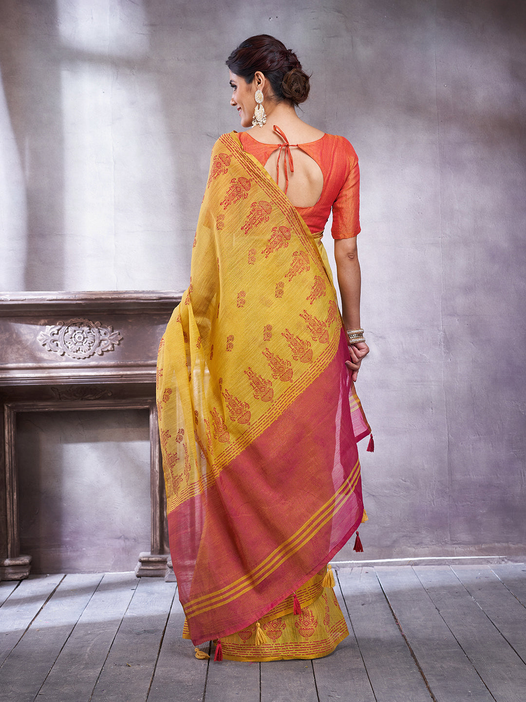 ZARI MAHAL-Elegant Mustard Yellow Linen Saree with Rust Red Contrast Pallu & Traditional Woven Motif Border Tassels