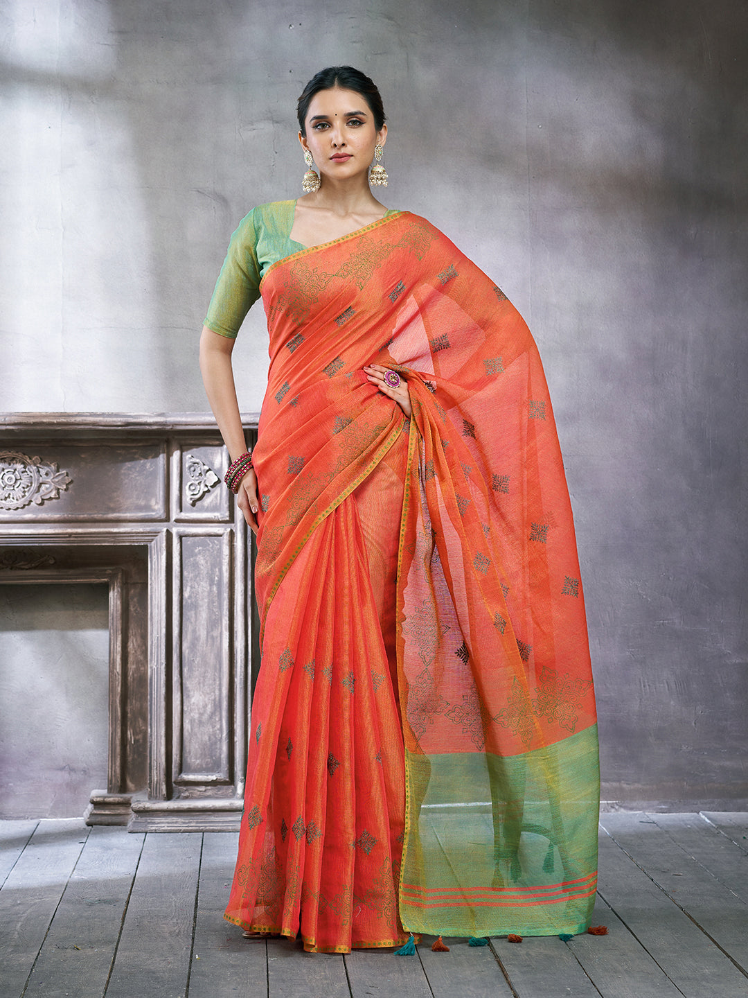 ZARI MAHAL-Elegant Coral Orange Linen Saree with Mint Green Contrast Border & Artistic Woven Motifs