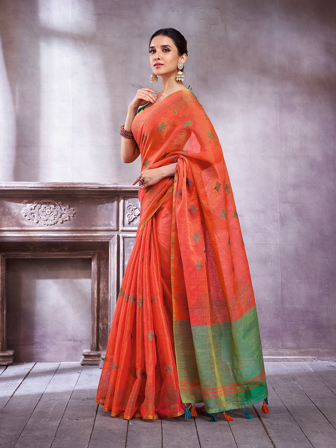 ZARI MAHAL-Elegant Coral Orange Linen Saree with Mint Green Contrast Border & Artistic Woven Motifs