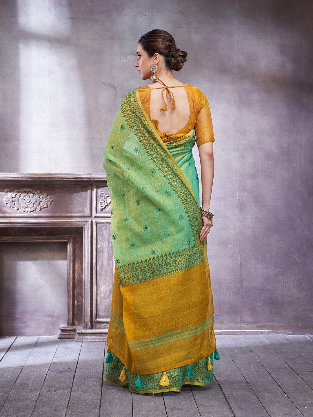 ZARI MAHAL-Elegant Aqua Green Linen Saree with Mustard Gold Contrast Pallu & Intricate Floral Woven Border