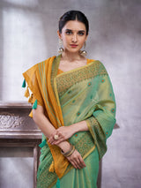 ZARI MAHAL-Elegant Aqua Green Linen Saree with Mustard Gold Contrast Pallu & Intricate Floral Woven Border