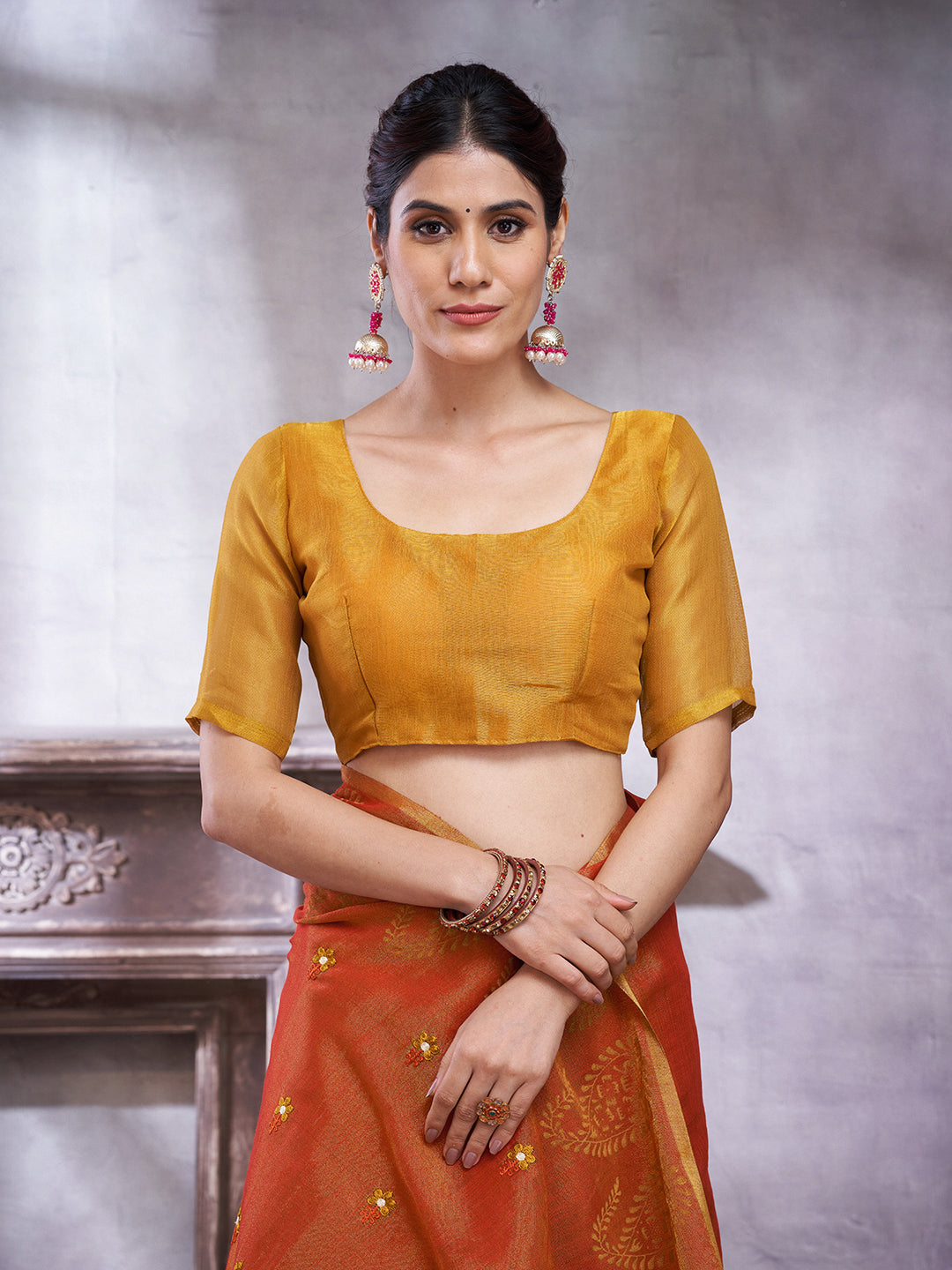 KOZI SILK-legant orange and mustard dual-tone saree with rich woven detailing