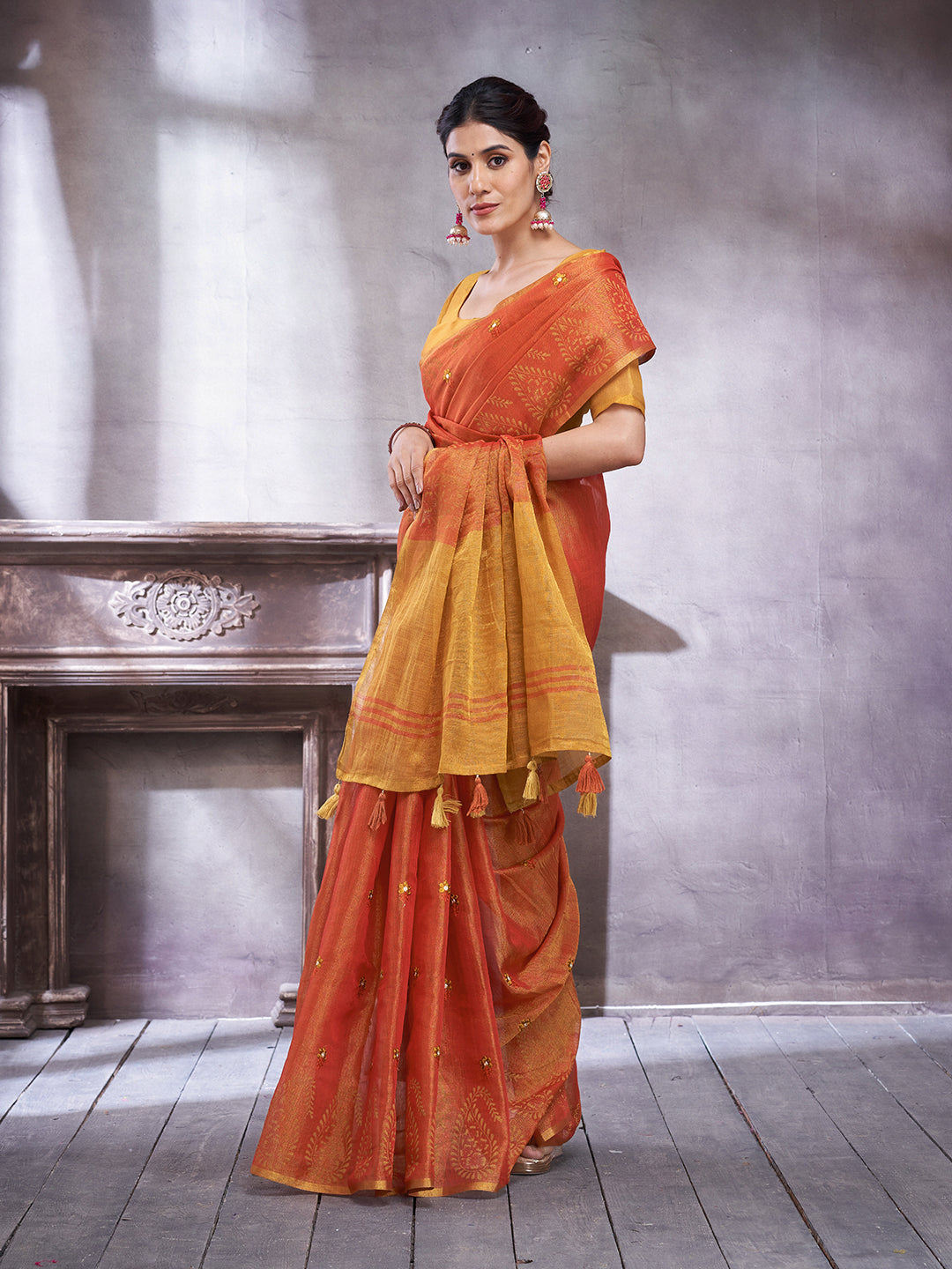 KOZI SILK-legant orange and mustard dual-tone saree with rich woven detailing