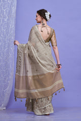 ZARI MAHAL-Elegant Beige Linen Saree with Intricate Woven Floral Border