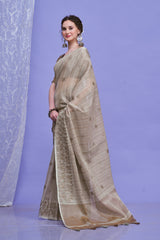ZARI MAHAL-Elegant Beige Linen Saree with Intricate Woven Floral Border